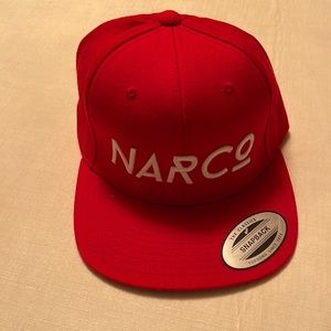 A brand new red snap back hat
